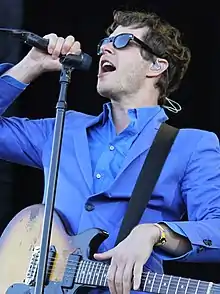 Damian Kulash performing live for an audience
