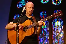 Danen Kane performing in Milwaukee, Wisconsin at Epikos Church on May 7, 2012.(Photo by Neal Van Slett, Vesper Guitars)