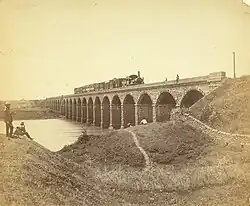 Photograph (1858) of the Dapoorie viaduct over the Mula River near Poona in Bombay Presidency.