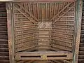 The wooden ceiling (with some painted and carved ornamentation) of the southern chamber