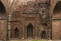 Ruined mihrabs and arabesque inside Darasbari Mosque, 15th-century
