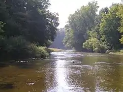 Along the West Branch of the Huron River in southeastern Oxford Township