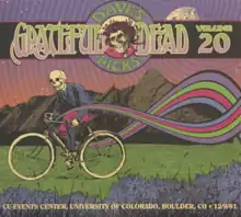 A skeleton dressed in old-fashioned clothes rides a bicycle on the grass. In the background are the Flatiron rock formations and the moon.