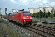 A freight train passes through Weilimdorf station