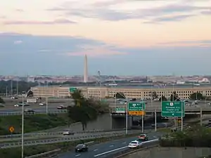 Cars on I-395, leaving Washington DC (in distance) and passing by the Pentagon in Arlington