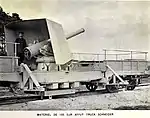 A gun with its firing platform lowered and outriggers extended.