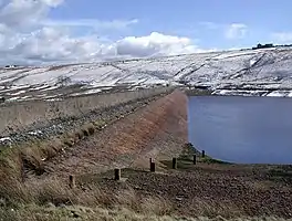 Picture of Deanhead Reservoir with snow on the surrounding hills