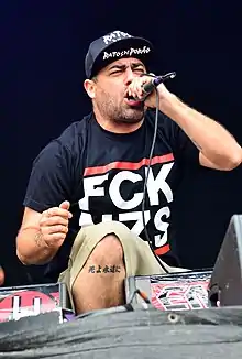 Schulz performing with Death by Stereo at Reload Festival 2015