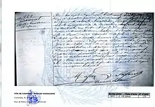 An archival black and white scan of a handwritten death certificate for Alceste Cœuriot from the village of Colombes. It is overlaid with a blue seal and bordered by white with archival information in the lower corners.