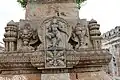 A relief sculpture on a minor shrine on a pedestal in the Ranganathaswamy temple at Srirangapatna