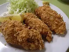 Deep fried oyster [ja] in Japan.