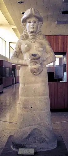 Life-sized statue of a goddess, probably Ishtar, holding a vase from Mari, Syria (eighteenth century BC)