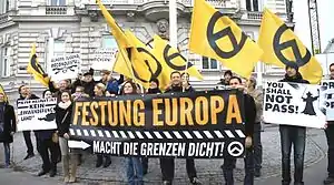 Far-right activists at an Identitarian Movement of Austria anti-immigration rally in Vienna
