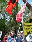 Demonstrators holding the flags of the Socialist Resistance of Kazakhstan and the Committee for a Workers' International, 26 April 2008