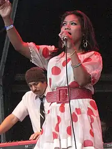 Chhom Nimol performing with Dengue Fever at Beautiful Days Festival 2008