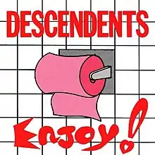 An album cover shows an illustration of a white tile bathroom wall, with a roll of pink toilet paper hanging from a holder. Across the top of the cover is the band's name, "Descendents", in large, red capital letters. Across the bottom is the album title "Enjoy!" in large, red, cartoon-style lettering.