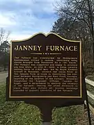 The descriptive plaque stating the history of Janney Furnace.