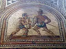 mosaic showing glasiators fighting