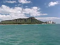 Diamond Head cone seen from the coast off Waikīkī
