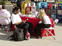 Streetside Scientology stress tests selling Dianetics books (2007)