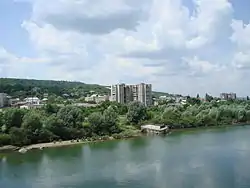 Image 14A view of Otaci, which is located on the southwestern bank of the Dniester River, which at that point forms the northeastern border of Moldova, July 2006. Here Otaci is seen from the Ukrainian town of Mohyliv-Podilskyi. The tower block in the foreground collapsed in 2019.