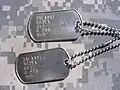 United States Army ID tags (serial number partially obscured), modern, designation (for BUDDHIST): BUD