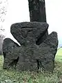 Stone cross in Saxon Cotta near Pirna (carving of an axe)