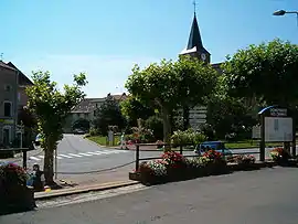 The church and surroundings in Dompierre-les-Ormes