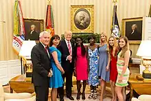 A picture of US President Donald Trump meeting two of the Chibok schoolgirls in June 2017