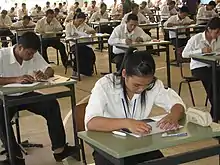 Cambodians doing an exam in order to apply for the Don Bosco Technical School of Sihanoukville in 2008.
