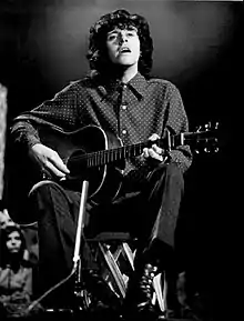 Photo of Donovan performing on The Smother Brothers television program.