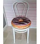 Donut cushion from an interior design department. Design of an edible donut.