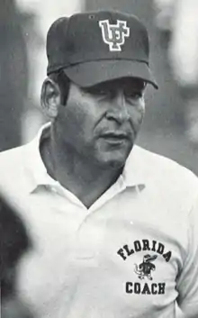 Doug Dickey, in Florida shirt and cap