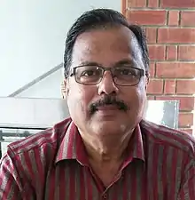 Dr K Puttaswamy