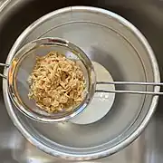 Draining steeped toasted cornflakes