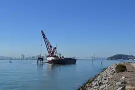 Grab (clamshell) dredge Njord of the Manson Construction Co. fleet in the Port of Oakland, California