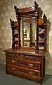 Dresser by Benn Pitman designer, Adelaide Nourse Pitman carver, Elizabeth Nourse attrib painter, c. 1882-1883, American black walnut, white oak, painted panels, glass, gilded brass