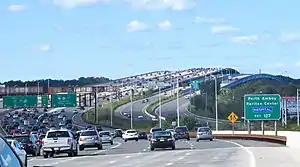 The Governor Alfred E. Driscoll Bridge on the Garden State Parkway in Central Jersey, with a total of 15 travel lanes and 6 shoulder lanes, is one of the world's widest and busiest motor vehicle bridges, as it crosses the Raritan River near its mouth at Raritan Bay.