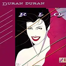 A white-skinned girl with a large smile and black hair, surrounded by a purple border. The words "Duran Duran" and "RIO" appear.