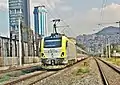 E68016 pulling a northbound train in Izmir.