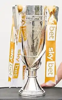 The trophy awarded to the play-off winners, pictured in Port Vale colours in 2022