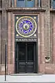 The astrological clock above the entrance, showing the Signs of the Zodiac