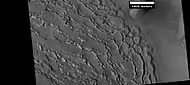 Well developed ribbed upper plains material.  These start with small cracks that expand as ice sublimates from the surfaces of the crack.  Picture was taken with HiRISE under HiWish program