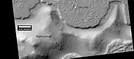 Lava flow.  Lava flow stopped when it encountered the higher ground of a mound.  Picture was taken with HiRISE under HiWish program.