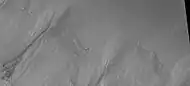 Close-up of gully aprons showing they are free of craters; hence very young.  Location is Phaethontis quadrangle.  Picture was taken  by HiRISE under HiWish program.