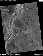 Dust devil tracks and layers, as seen by HiRISE under HiWish program