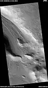 Valley showing Lineated valley fill, as seen by HiRISE under HiWish program Linear valley flow is caused by ice movements.  Location is Casius quadrangle.