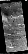 Wide view of surface with spots displaying mantle, as seen by HiRISE under HiWish program