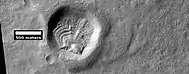 Layered feature in crater, as seen by HiRISE under HiWish program