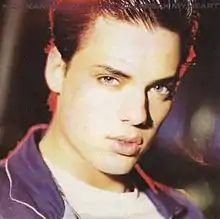 Nick Kamen looking towards the camera